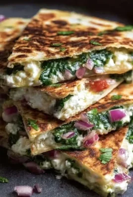 Mediterranean Quesadillas with Spinach, Feta, Mozzarella, and Red Onion